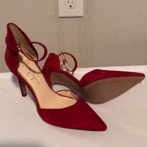 Red suede pumps